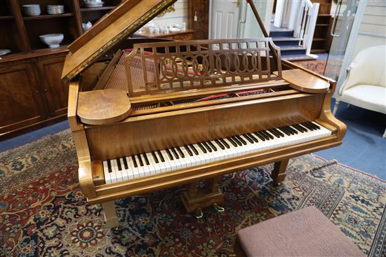 A Steinway & Sons figured walnut boudoir grand piano, W.4ft 8in. L.5ft 10in.